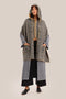 Hooded shawl with  pockets and tassels